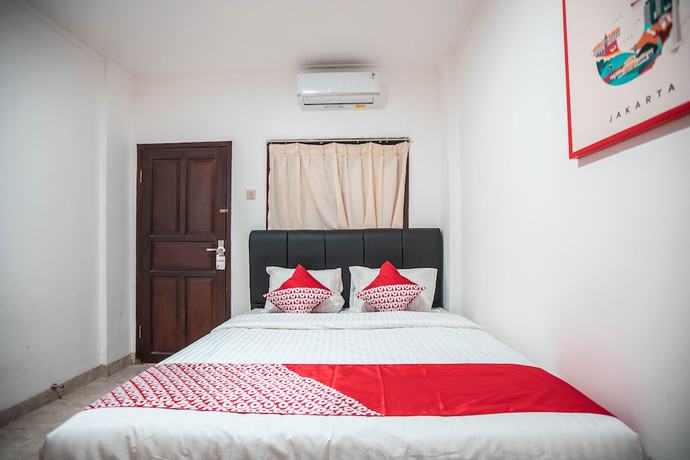 Imagen de la habitación del Hotel OYO 868 Wisma Berkat. Foto 4