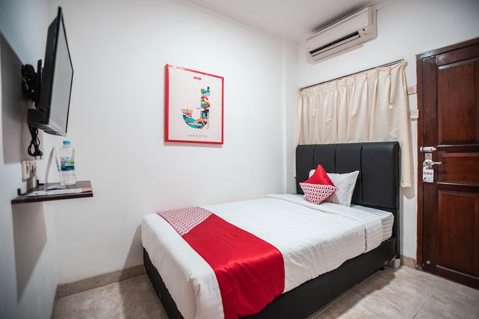 Imagen de la habitación del Hotel OYO 868 Wisma Berkat. Foto 5