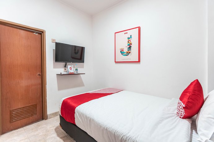 Imagen de la habitación del Hotel OYO 868 Wisma Berkat. Foto 6