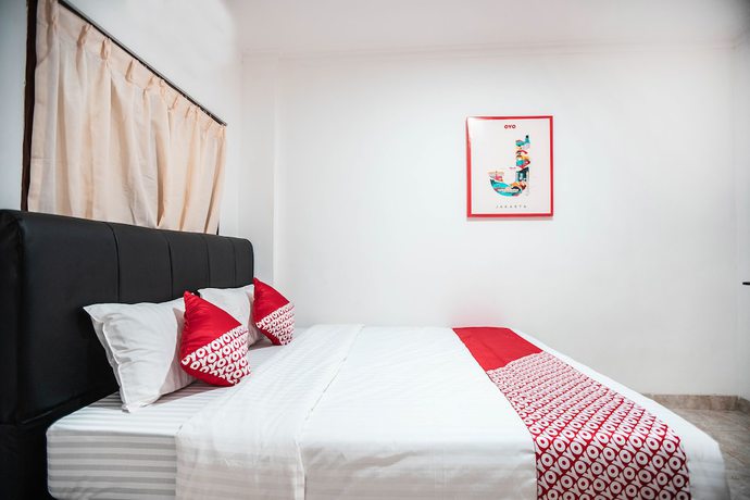 Imagen de la habitación del Hotel OYO 868 Wisma Berkat. Foto 7