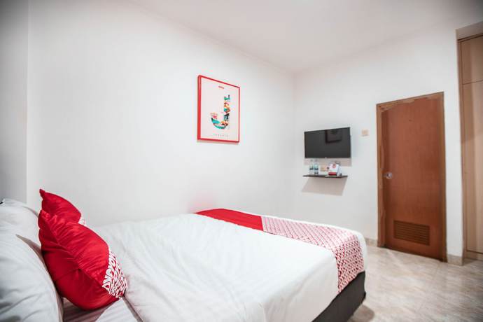 Imagen de la habitación del Hotel OYO 868 Wisma Berkat. Foto 8