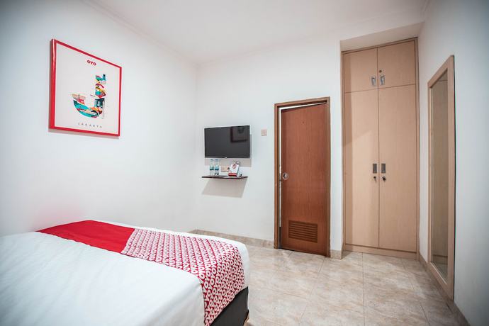 Imagen de la habitación del Hotel OYO 868 Wisma Berkat. Foto 9