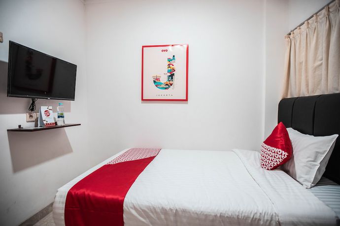 Imagen de la habitación del Hotel OYO 868 Wisma Berkat. Foto 10