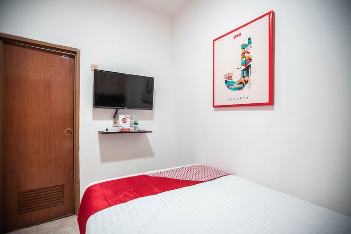 Imagen de la habitación del Hotel OYO 868 Wisma Berkat. Foto 12