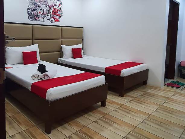 Imagen de la habitación del Hotel OYO 869 Jnv Dream. Foto 12