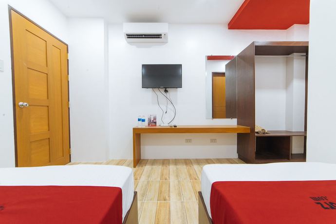 Imagen de la habitación del Hotel OYO 869 Jnv Dream Hotel. Foto 9