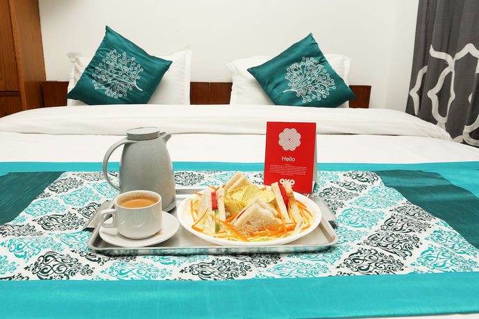 Imagen del bar/restaurante del Hotel OYO 8714 Amar. Foto 2