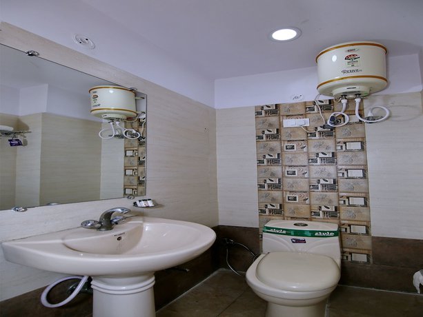 Imagen de la habitación del Hotel OYO 8764 Green View Palace. Foto 11