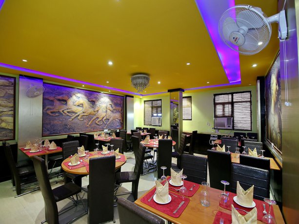 Imagen del bar/restaurante del Hotel OYO 8764 Green View Palace. Foto 3