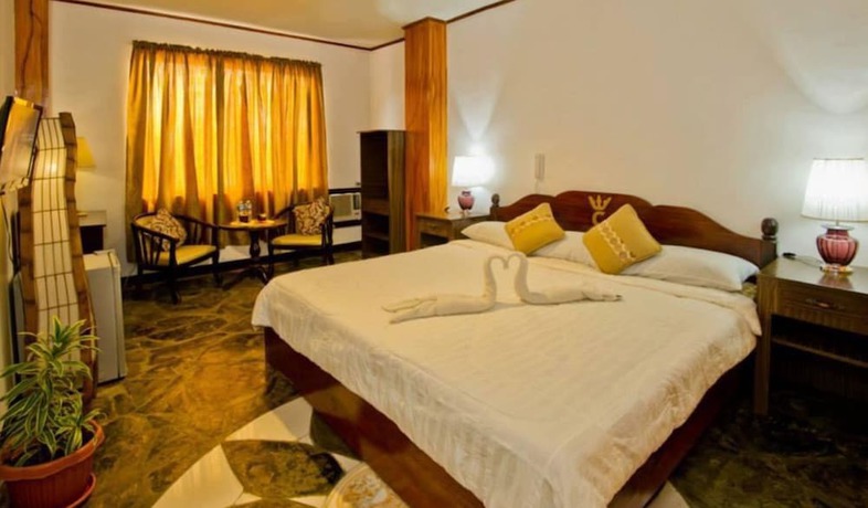 Imagen de la habitación del Hotel OYO 880 Flores De Musa Inn. Foto 2