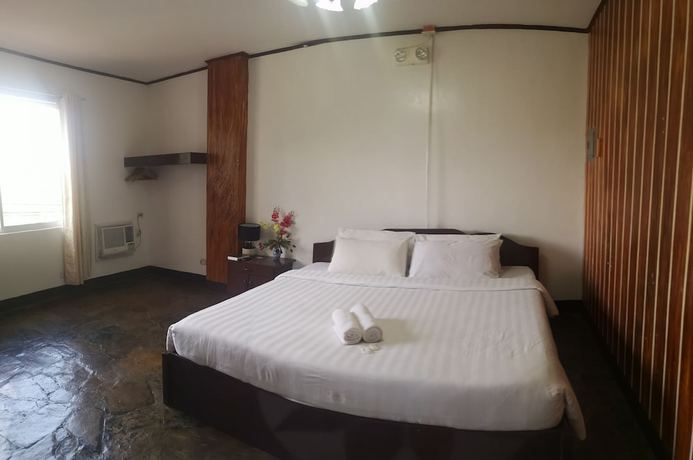 Imagen de la habitación del Hotel OYO 880 Flores De Musa Inn. Foto 7