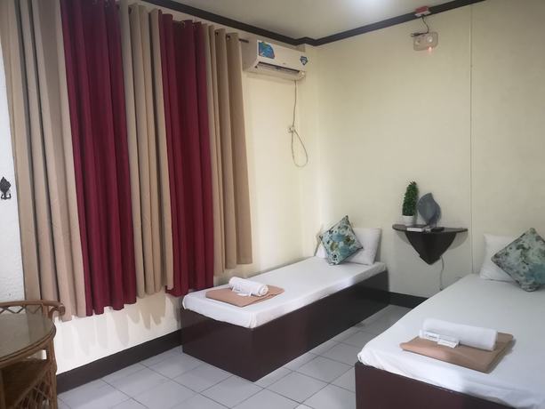 Imagen de la habitación del Hotel OYO 880 Flores De Musa Inn. Foto 9