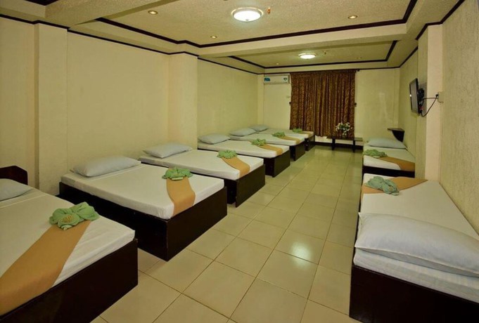 Imagen de la habitación del Hotel OYO 880 Flores De Musa Inn. Foto 10