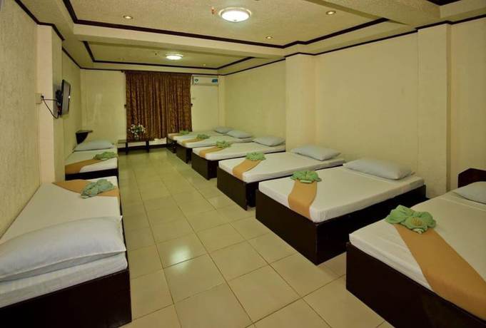 Imagen de la habitación del Hotel OYO 880 Flores De Musa Inn. Foto 11