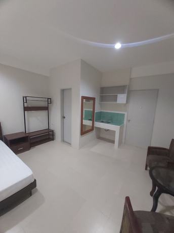 Imagen de la habitación del Hotel OYO 881 Nest Suites. Foto 2