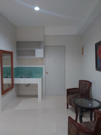 Imagen de la habitación del Hotel OYO 881 Nest Suites. Foto 3