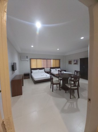 Imagen de la habitación del Hotel OYO 881 Nest Suites. Foto 6