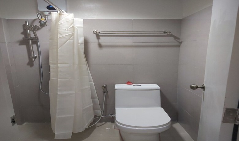 Imagen de la habitación del Hotel OYO 881 Nest Suites. Foto 11