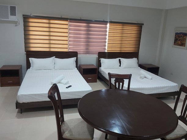 Imagen de la habitación del Hotel OYO 881 Nest Suites. Foto 12