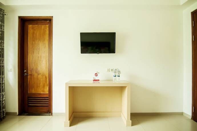 Imagen de la habitación del Hotel OYO 882 Puri Gevana Guest House. Foto 8