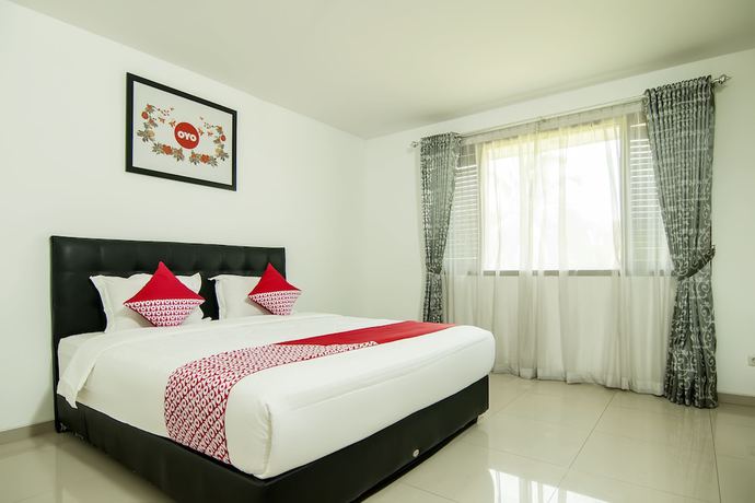 Imagen de la habitación del Hotel OYO 882 Puri Gevana Guest House. Foto 9