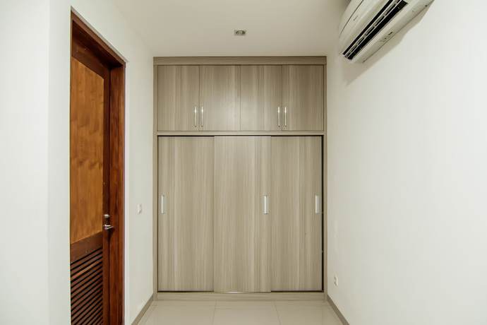 Imagen de la habitación del Hotel OYO 882 Puri Gevana Guest House. Foto 11