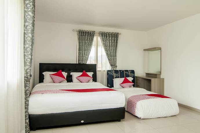 Imagen de la habitación del Hotel OYO 882 Puri Gevana Guest House. Foto 15