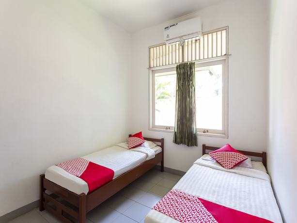 Imagen de la habitación del Hotel OYO 883 Pavo Resort. Foto 3