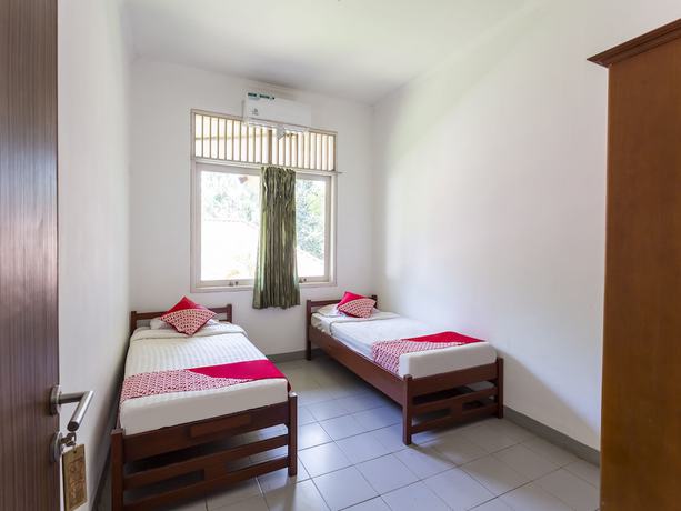 Imagen de la habitación del Hotel OYO 883 Pavo Resort. Foto 15