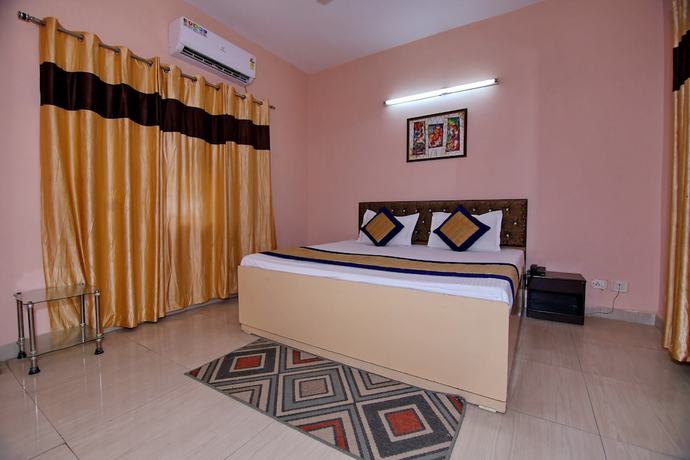 Imagen de la habitación del Hotel OYO 8907 The Nest. Foto 10