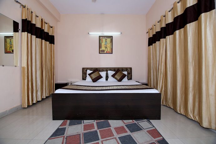 Imagen de la habitación del Hotel OYO 8907 The Nest. Foto 13