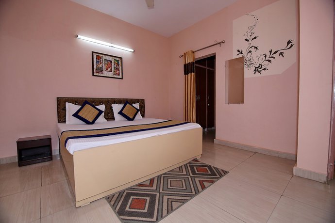 Imagen de la habitación del Hotel OYO 8907 The Nest. Foto 14