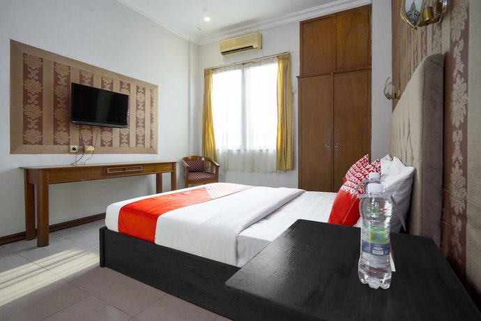 Imagen de la habitación del Hotel OYO 891 Gading Kencana. Foto 2