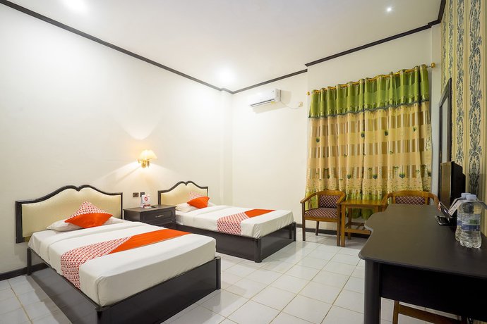 Imagen de la habitación del Hotel OYO 891 Gading Kencana. Foto 4