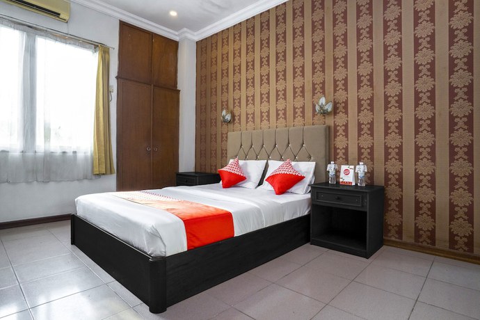 Imagen de la habitación del Hotel OYO 891 Gading Kencana. Foto 8