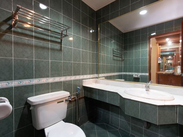 Imagen de la habitación del Hotel OYO 89300 Zen Garden Resort. Foto 2