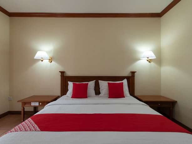 Imagen de la habitación del Hotel OYO 89300 Zen Garden Resort. Foto 6