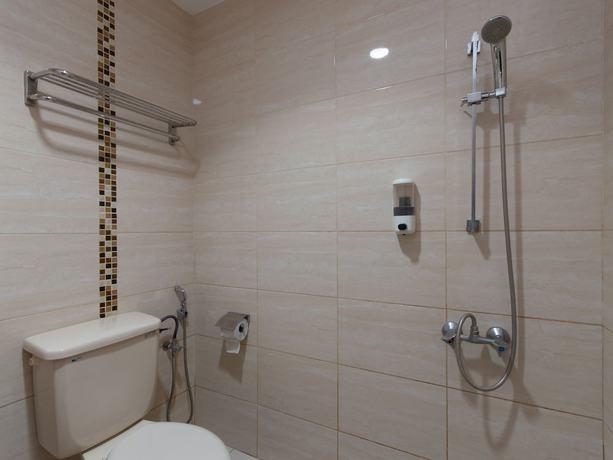 Imagen de la habitación del Hotel OYO 89300 Zen Garden Resort. Foto 8