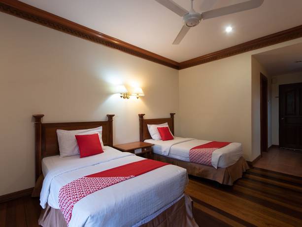 Imagen de la habitación del Hotel OYO 89300 Zen Garden Resort. Foto 10