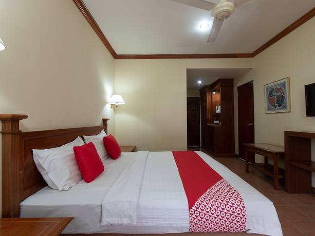 Imagen de la habitación del Hotel OYO 89300 Zen Garden Resort. Foto 13