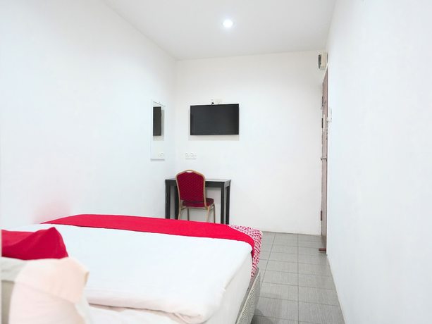 Imagen de la habitación del Hotel OYO 89373 Nobel Homestay. Foto 2