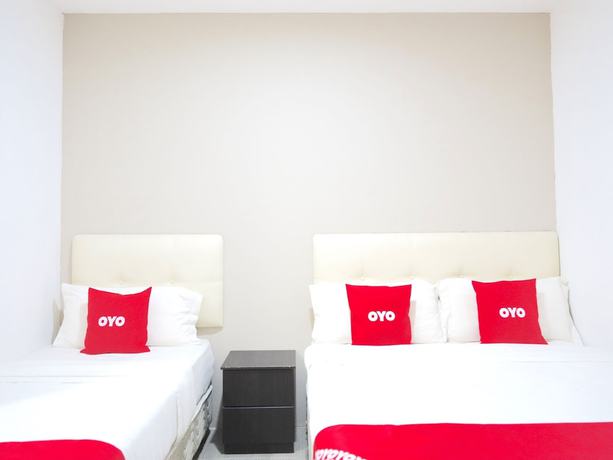 Imagen de la habitación del Hotel OYO 89373 Nobel Homestay. Foto 4