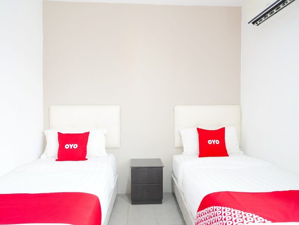 Imagen de la habitación del Hotel OYO 89373 Nobel Homestay. Foto 5