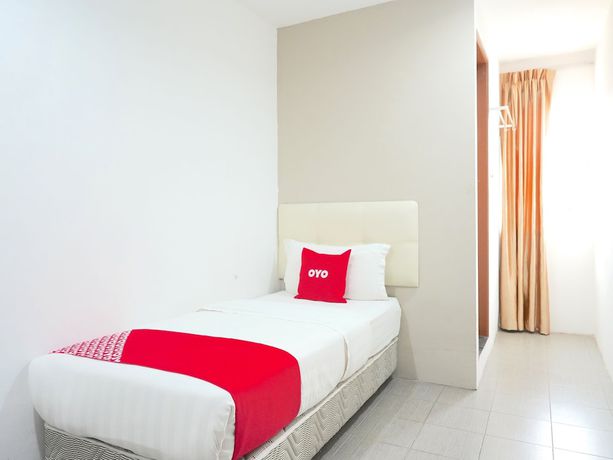 Imagen de la habitación del Hotel OYO 89373 Nobel Homestay. Foto 6