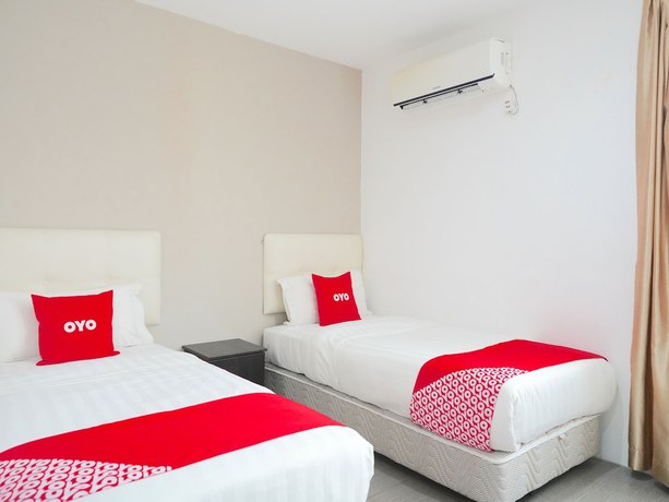 Imagen de la habitación del Hotel OYO 89373 Nobel Homestay. Foto 7