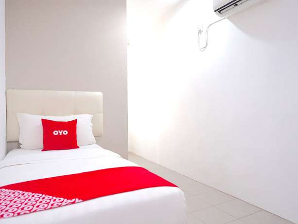 Imagen de la habitación del Hotel OYO 89373 Nobel Homestay. Foto 8