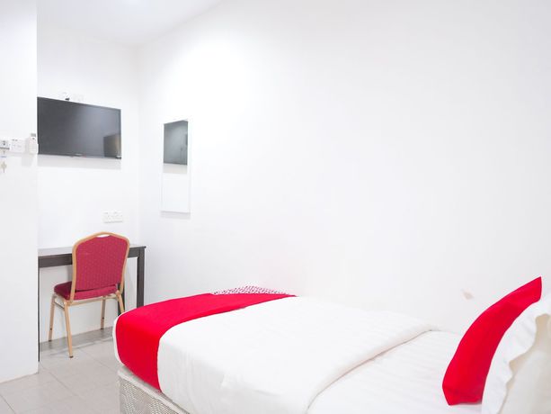 Imagen de la habitación del Hotel OYO 89373 Nobel Homestay. Foto 9