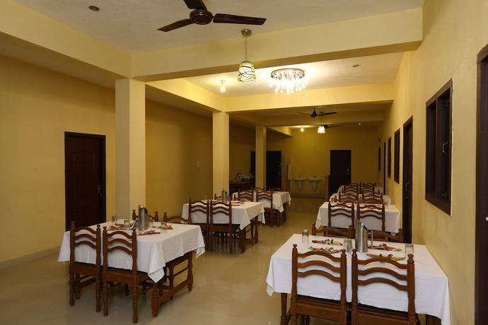 Imagen del bar/restaurante del Hotel OYO 8938 near Auroville Beach. Foto 3