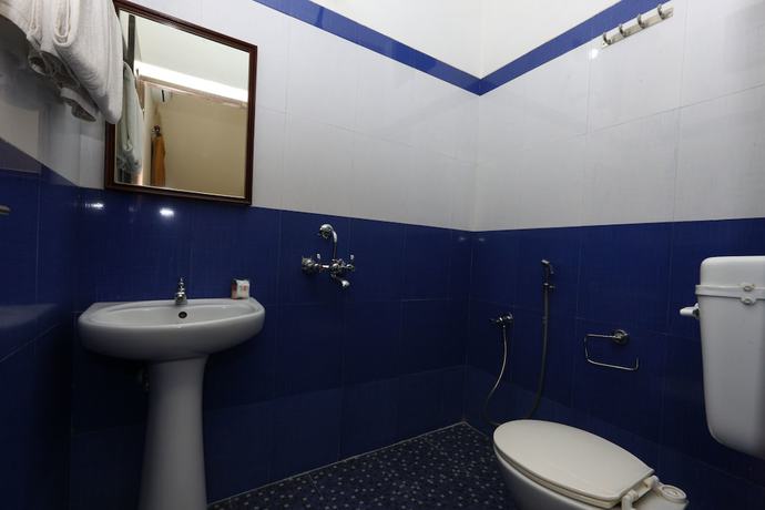 Imagen de la habitación del Hotel OYO 8938 near Auroville Beach. Foto 14