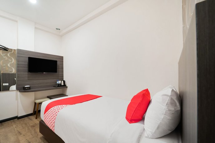 Imagen de la habitación del Hotel OYO 89386 Stay 365 Hotel. Foto 5
